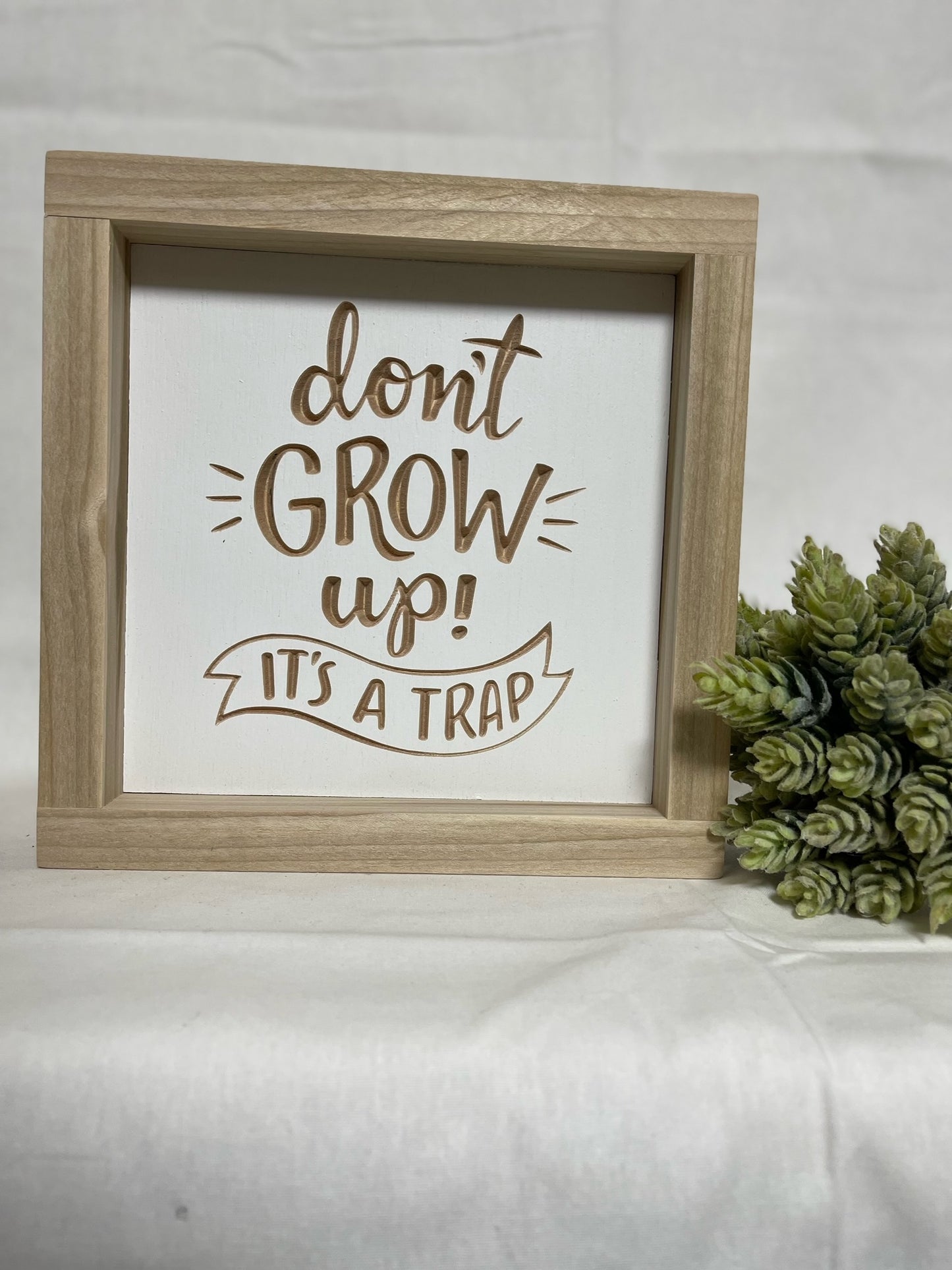 Don't Grow Up 7X7 Wood Sign