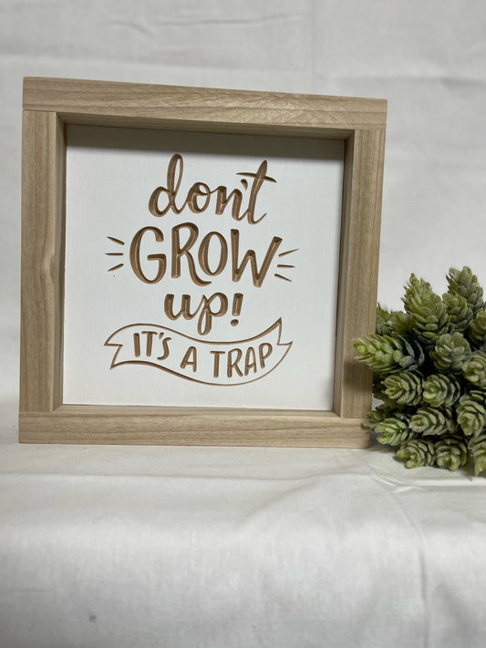 Don't Grow Up 7X7 Wood Sign